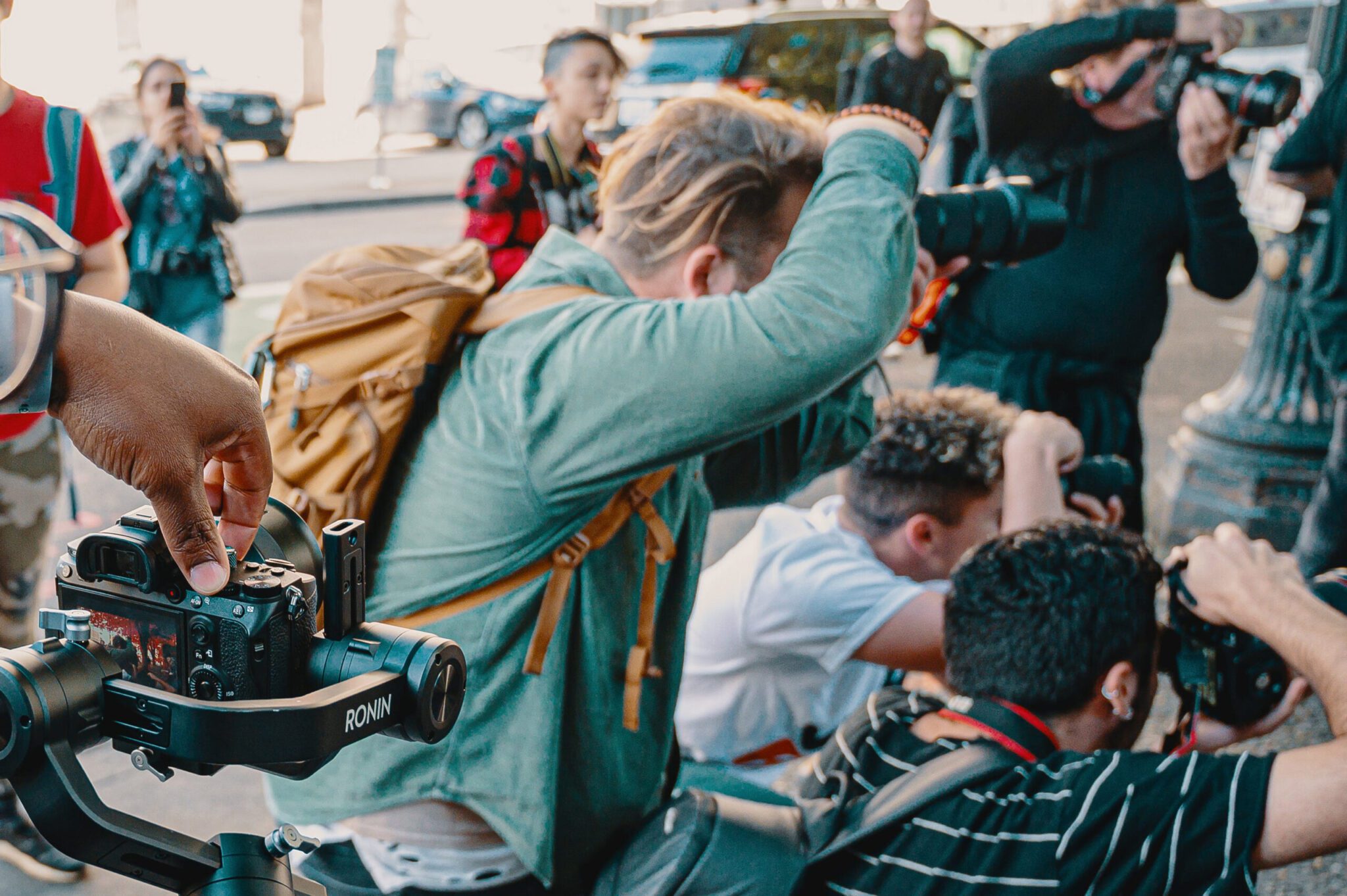 Groep fotografen aan het werk